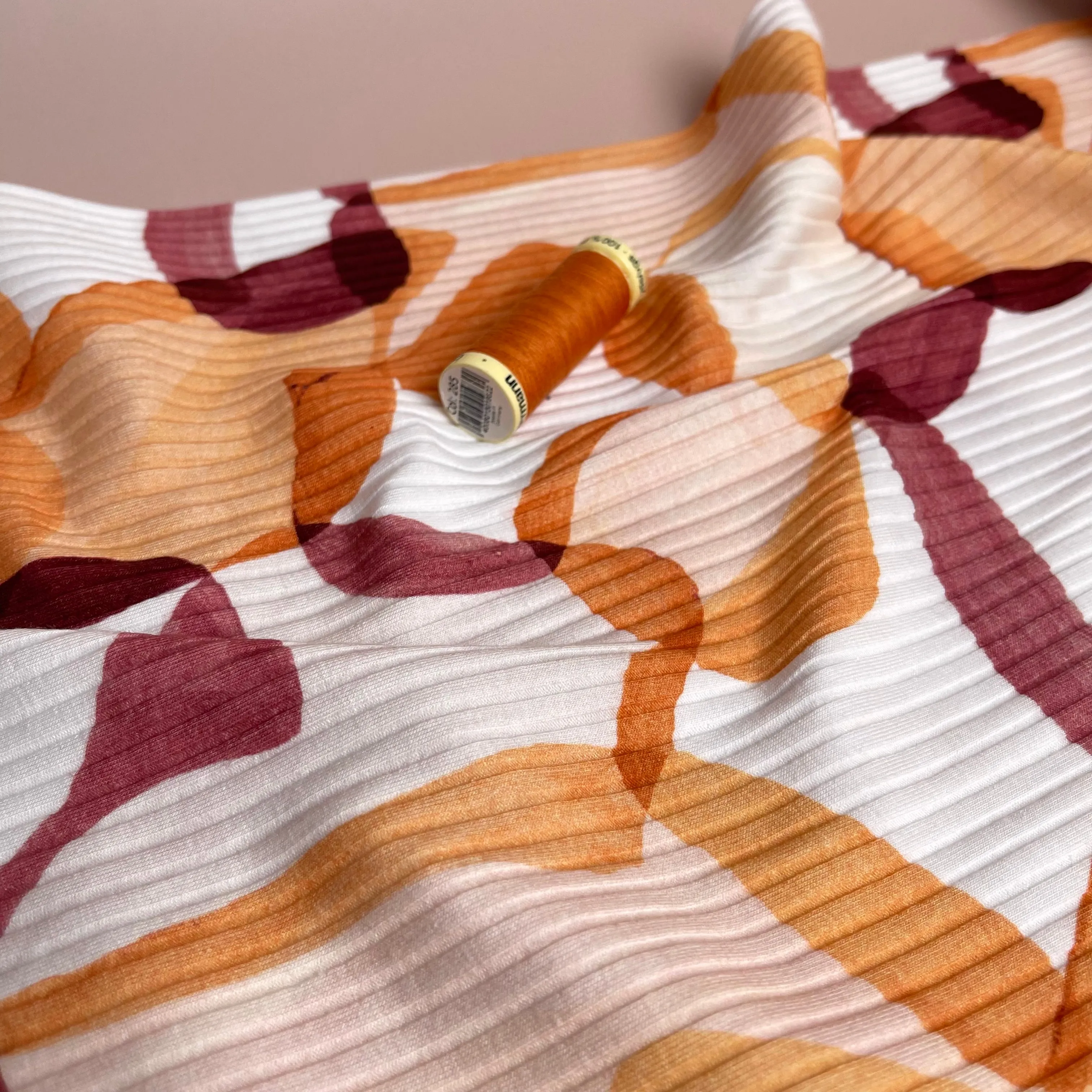 REMNANT 0.35 Metre - Abstract Shapes Rust Cotton Ribbed Jersey