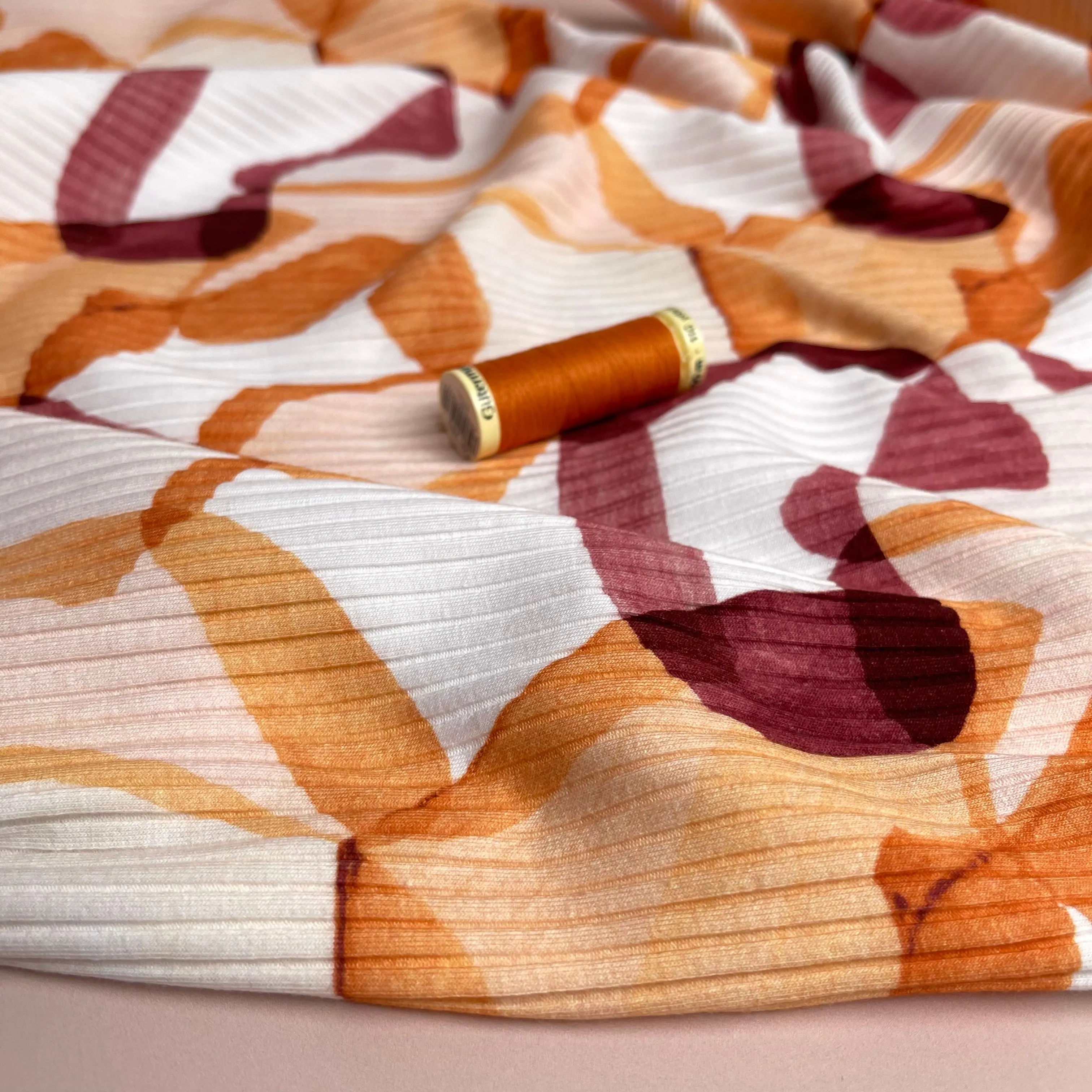 REMNANT 0.35 Metre - Abstract Shapes Rust Cotton Ribbed Jersey