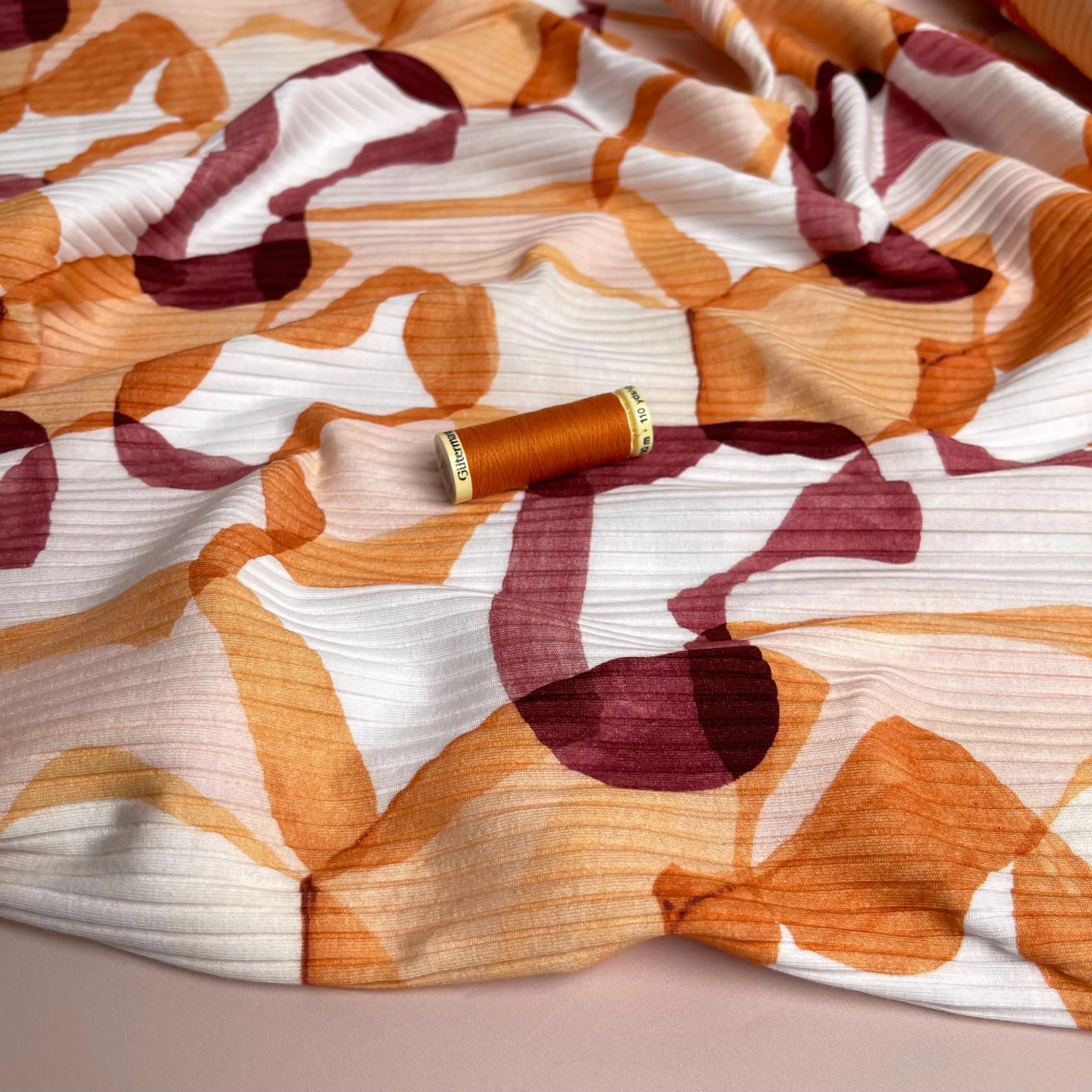 REMNANT 0.35 Metre - Abstract Shapes Rust Cotton Ribbed Jersey