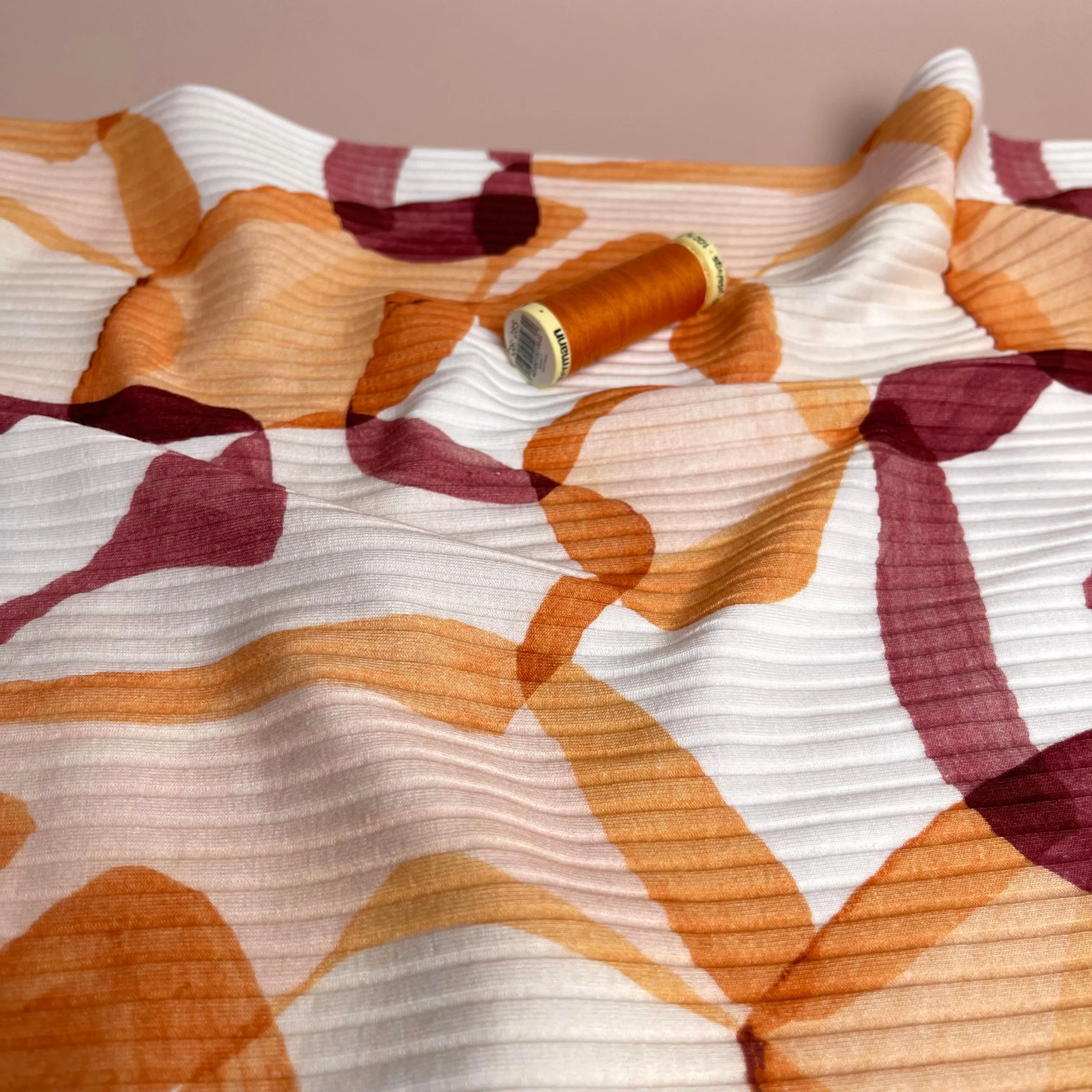 REMNANT 0.35 Metre - Abstract Shapes Rust Cotton Ribbed Jersey
